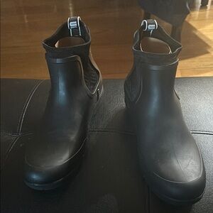 Sleek Black Ankle Boots with Rounded Toe and Buckle Straps